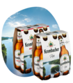 Zwei Sixpacks Krombacher Pils und Pils Alkoholfrei mit Flaschen und Etiketten vor Seemotiv im Hintergrund