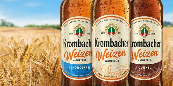 Krombacher Weizen in den Sorten Alkoholfrei, Naturtrüb und Dunkel vor einem Weizenfeld.