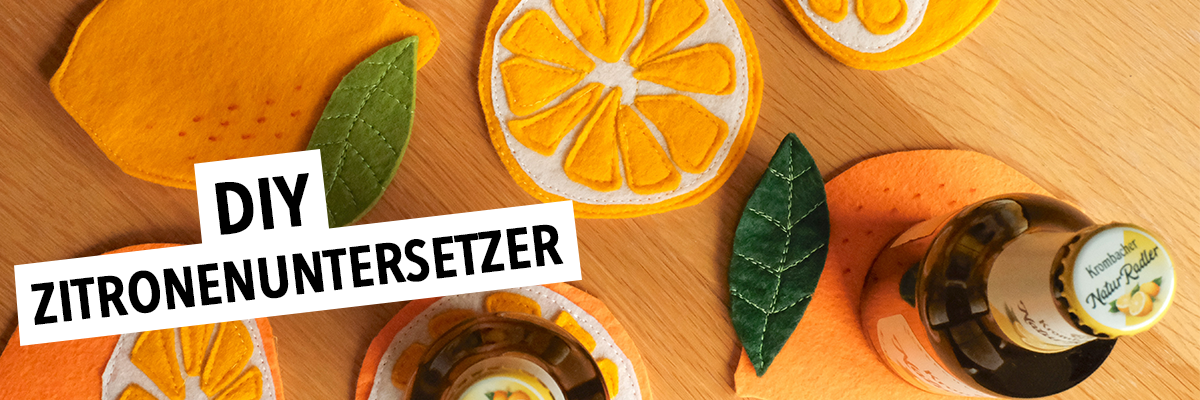 Zitronenuntersetzer aus gelben Filz mit Text: DIY Zitronenuntersetzer.