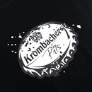 Illustrierter Kronkorken auf schwarzem Stoff.