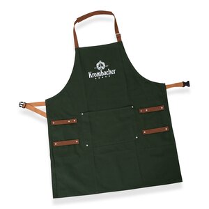 Grüne Krombacher Grillschürze mit braunen Trägern und Logo in der Mitte. 