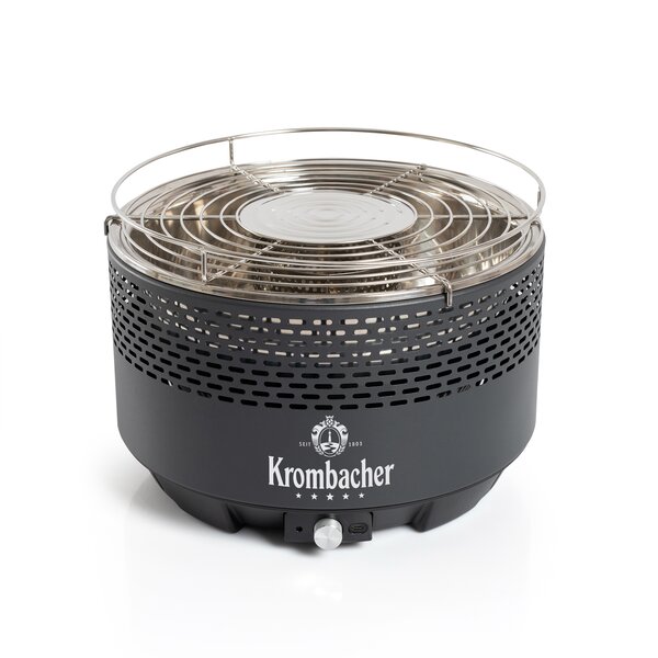 Rauchfreier Grill von Krombacher mit rundem schwarzen Gehäuse und Edelstahl-Grillrost